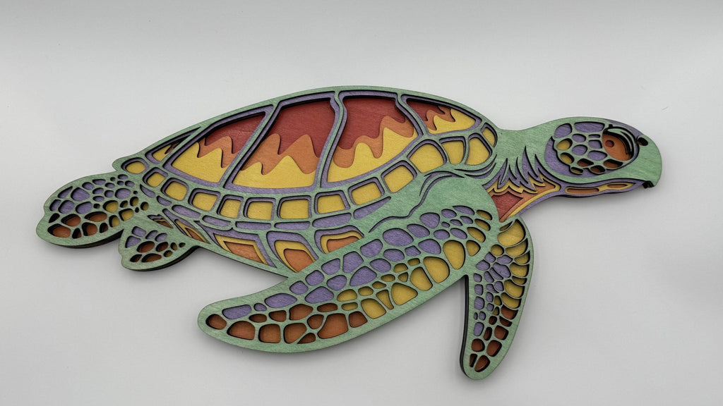 Multi-layered laser-cut 3D sea turtle wall art in green purple yellow red coastal decor by Shoreline Custom Creations